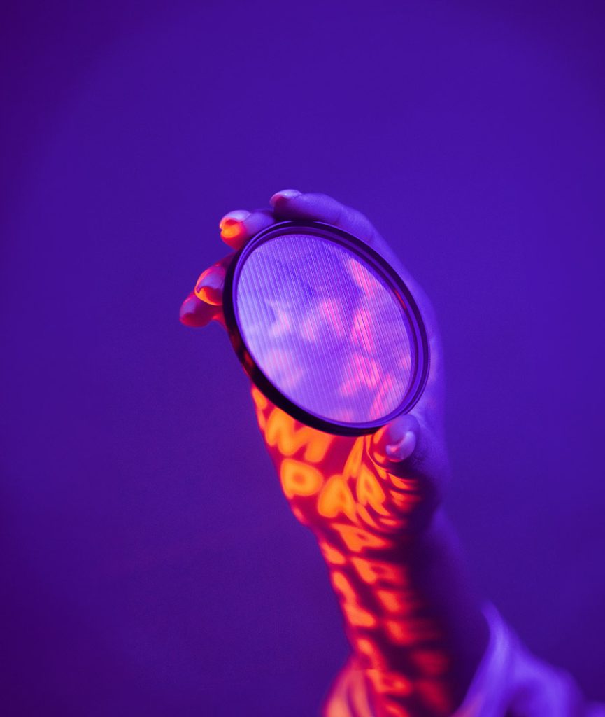 Photo of a person holding a glass filter